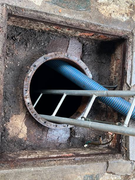 istock Washing and making safe an old underground diesel tank 2153251004