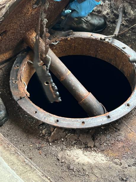 istock Washing and making safe an old underground diesel tank 2153251018