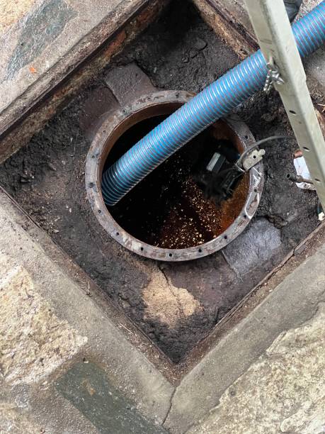 istock Washing and making safe an old underground diesel tank 2153251033