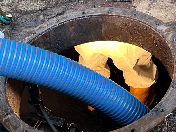 istock Washing and making safe an old underground diesel tank 2153251062