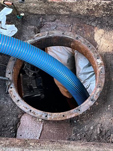 istock Washing and making safe an old underground diesel tank 2153251114