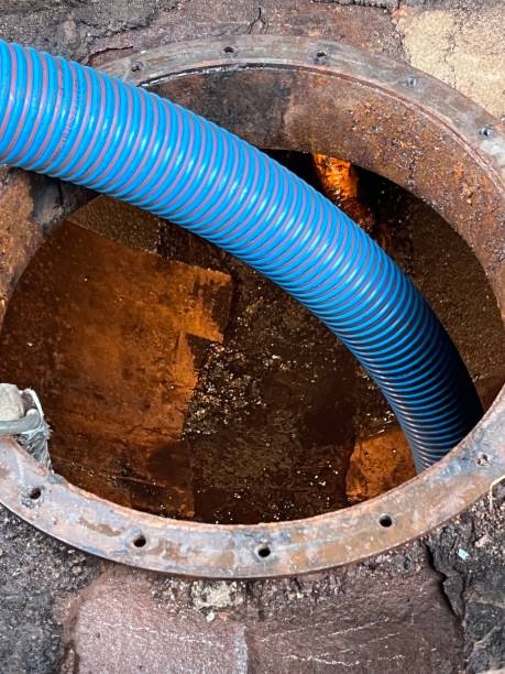 istock Washing and making safe an old underground diesel tank 2153251162