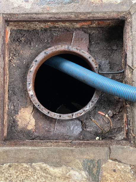 istock Washing and making safe an old underground diesel tank 2153251188
