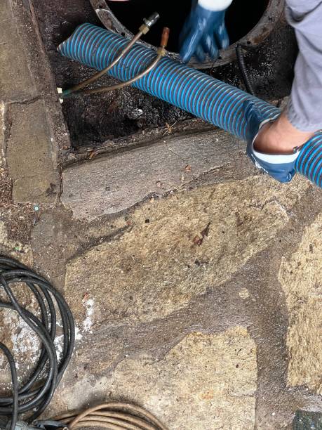 istock Washing and making safe an old underground diesel tank 2153251190