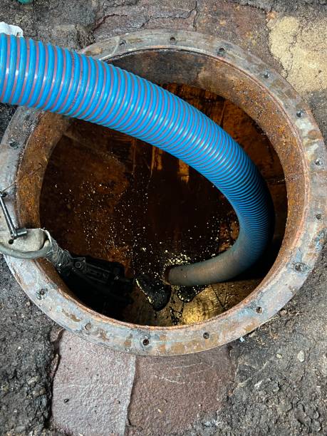 istock Washing and making safe an old underground diesel tank 2153251194