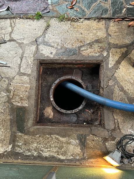 istock Washing and making safe an old underground diesel tank 2153251201