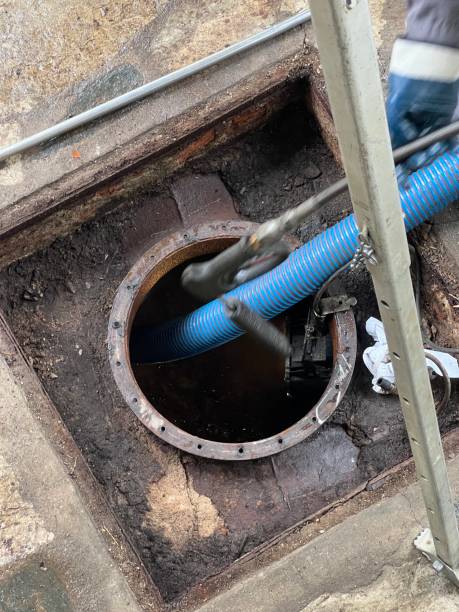 istock Washing and making safe an old underground diesel tank 2153251203