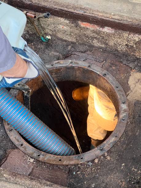 istock Washing and making safe an old underground diesel tank 2153251218