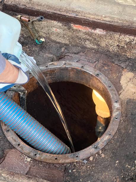 istock Washing and making safe an old underground diesel tank 2153251219