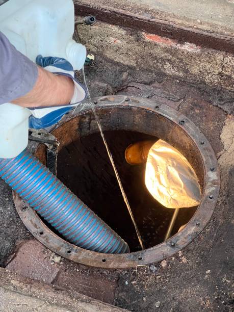 istock Washing and making safe an old underground diesel tank 2153251225