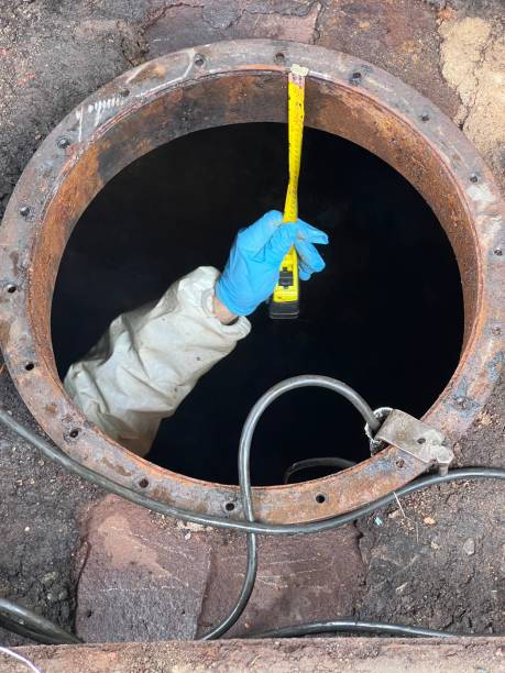 istock Washing and making safe an old underground diesel tank 2153251257
