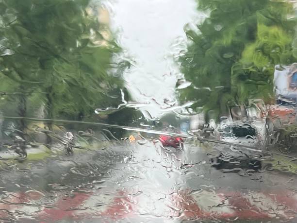 istock driving the car during a thunderstorm downpour 2153251591