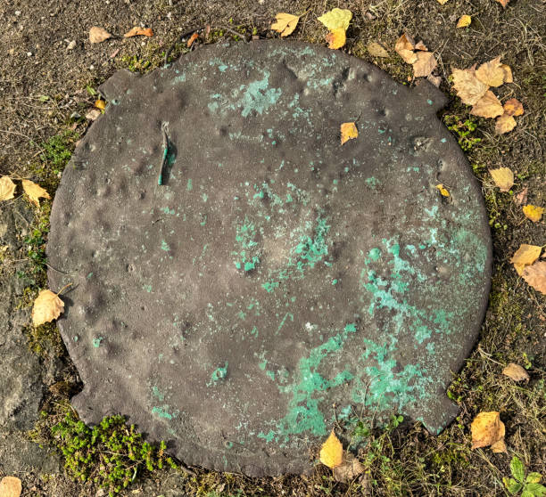 istock Sewer hatch on the ground in the park 2153251796