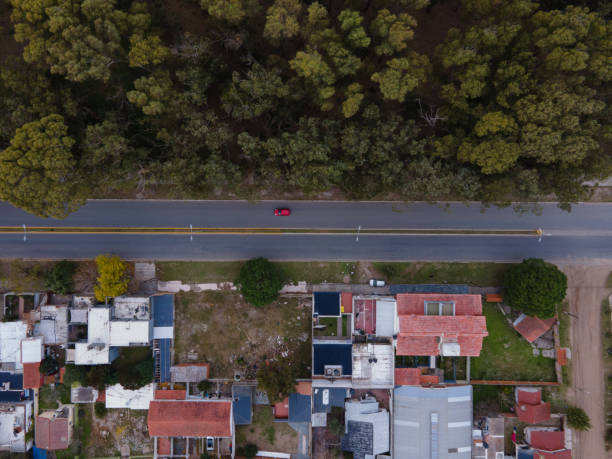istock Aerial photo of road divided by trees and constructions 2153254637