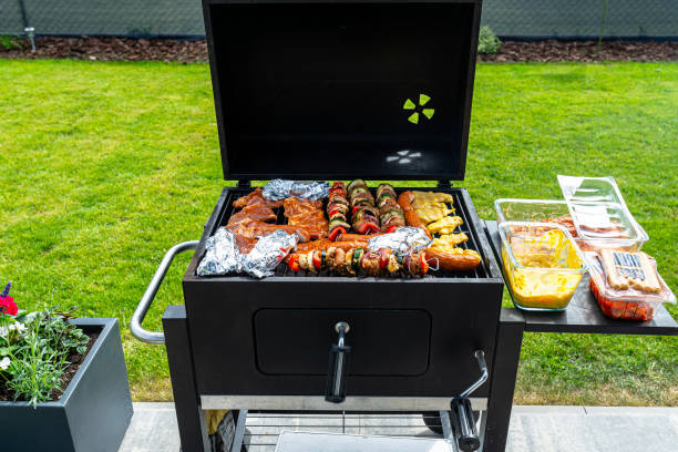 istock A modern rectangular grill standing on a paving slab on a garden terrace. 2153256369