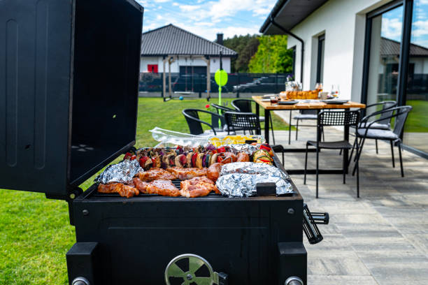 istock A modern rectangular grill standing on a paving slab on a garden terrace. 2153256411