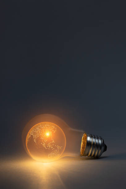 istock Artificial intelligence earth concept with classic light bulb glowing in the dark 2153256860
