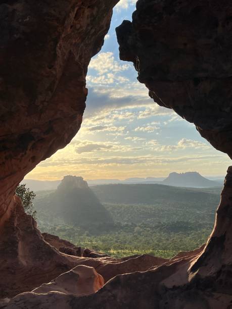 istock Eroded hole on sandstone at top of hill. 2153259857