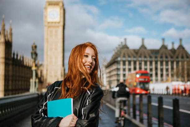 istock Happy beautiful female student in London 2153262690