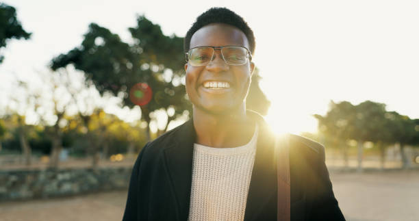 istock Portrait, black man and smile for commute to work, professional and travel to office. Face, morning and businessman with eyewear for law firm attorney, employee and happy with confidence and glasses 2153263473