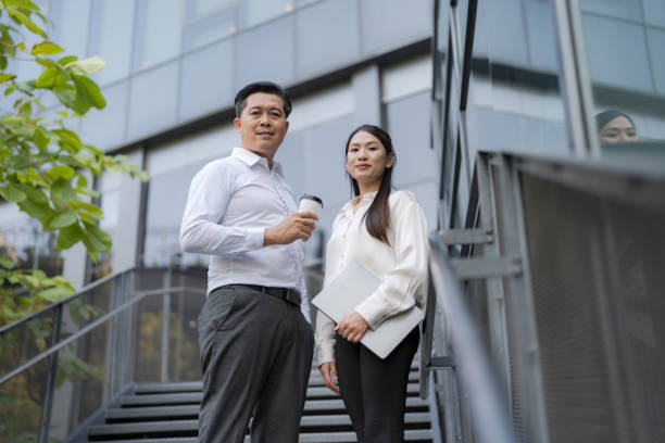 istock Business colleagues discussing work outdoors 2153266245