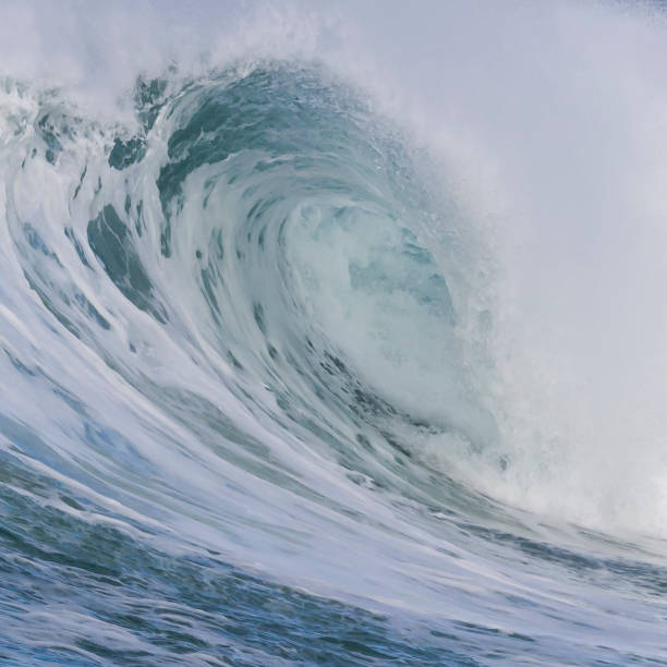 Wave breaking on the beach in close up, Hebrides