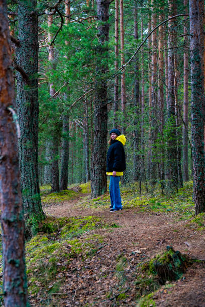 istock Woman Walking on a Forest Trail 2153270332