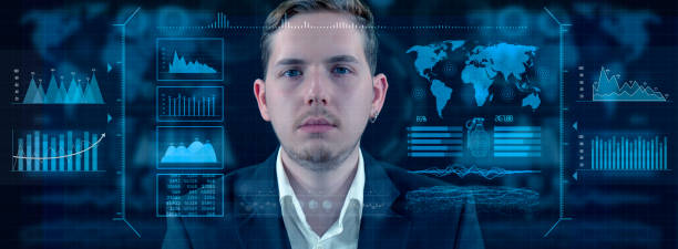 istock The man is looking at the digital interface, giving attention to specific data on the HUD. This is futuristic, virtual reality, hologram, and technology concept. 2153274540