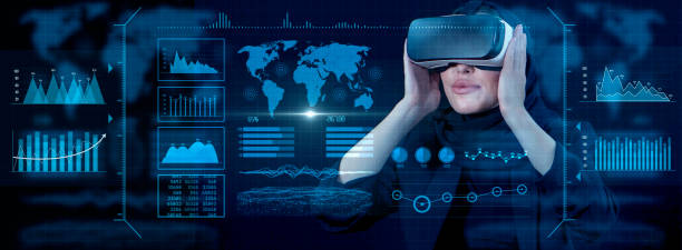 istock Woman wearing a VR headset at work. Businesswoman using VR goggle to look at financial data analysis. Contraption. 2153274607