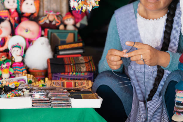 istock Close-up of a latin woman's hands weaving 2153283409