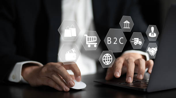 istock Businessmen use laptop with virtual B2C icons. E-commerce marketing strategy. 2153287329