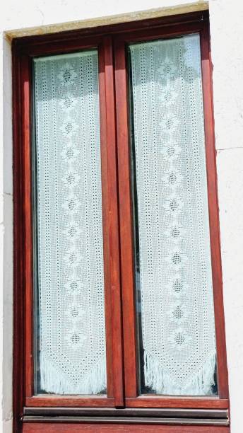 istock wooden window, authentic white curtain 2153289524