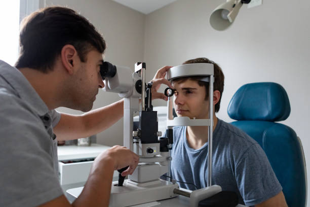 istock Ophthalmologist examining patient in his office 2153300217