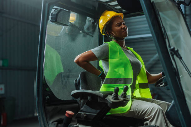 istock Woman having extreme back pains at warehouse job 2153303574