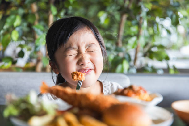 Girl eating lunch at cafe