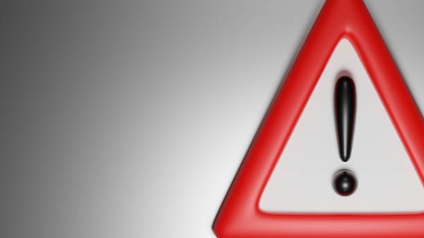 istock 3D rendering of warning sign, red triangle with exclamation mark, on gray background. 2153313234