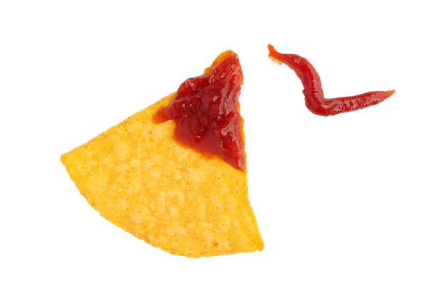 Nachos Mexican chips.Nachos chips corn chips with sauce isolated on white background with clipping path.