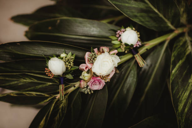 Wedding flowers for groom and groomsmen with copy space