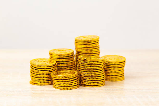 Toy gold coins piled up on the desk