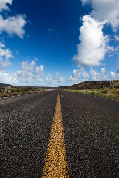 istock Endless road in Arizona with blue sky 2153328322