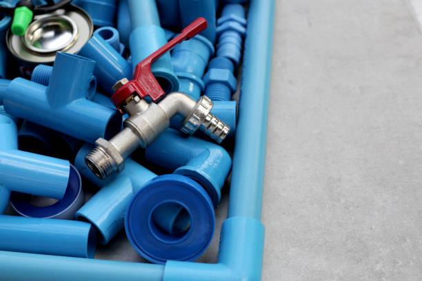 istock Plumber equipment with blue pvc pipe connections for plumbing work. 2153328637