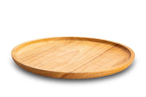 istock High angle view of empty round wooden plate isolated on white background. 2153329431