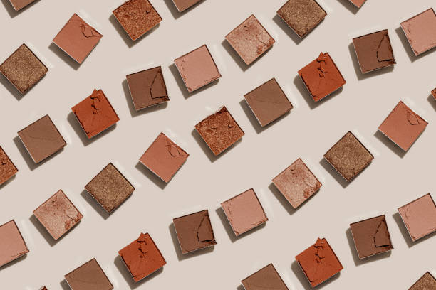 istock Beauty product neutral color eyeshadows for makeup, beige monochrome pattern on light background, flat lay with nude colors swatches eyeshade, cosmetic texture, beige color palette, top view pattern 2153331544