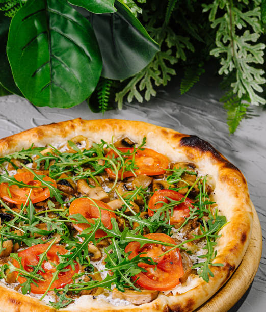 istock Fresh gourmet vegetarian pizza with arugula 2153334239