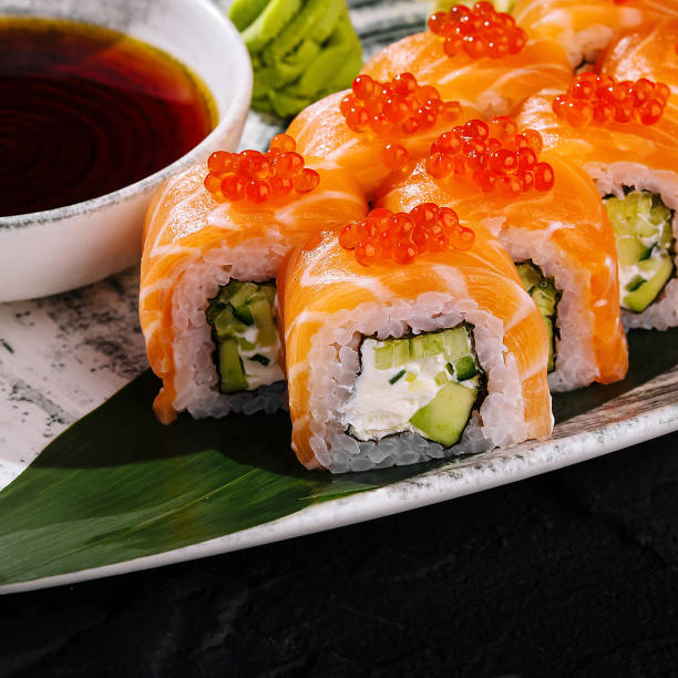 istock Exquisite sushi roll platter with salmon roe 2153334245