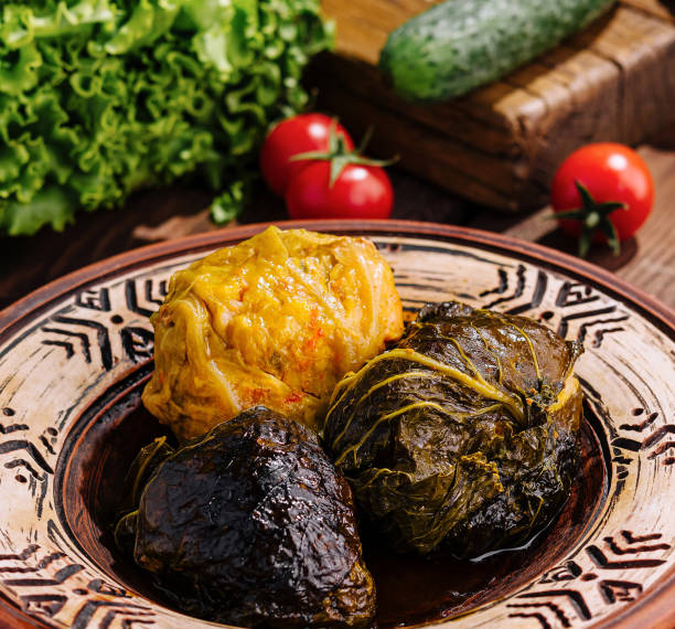 istock Traditional stuffed grape leaves on ceramic plate 2153336417