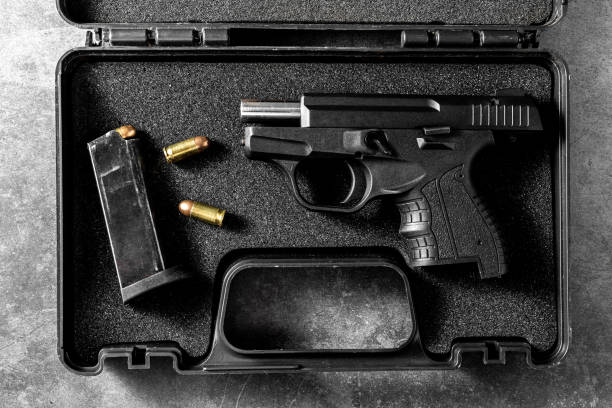 istock 9 mm gun and ammunition in gun box 2153336815