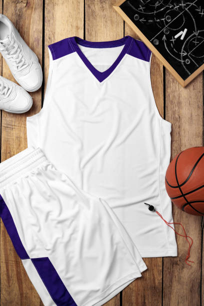 istock Basketball uniform on wooden background top view 2153337466