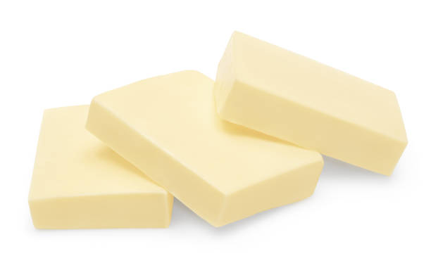 istock Pieces of butter isolated on white background. clipping path 2153337481