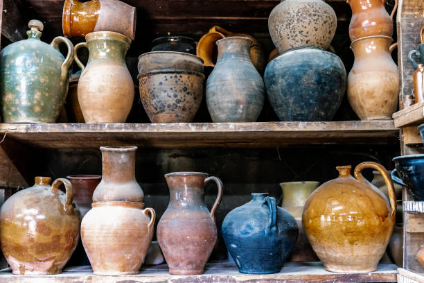 istock Pottery old craft dishes, jugs, pots. Old rustic pottery 2153338341